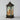 Decorative lantern with stained glass design on a gray background