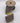 Decorative ribbon with gemstone-like embellishments on a spool, branded 'd.stevens'.