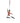A festive nutcracker ornament depicting a dancing soldier in a red coat, white pants, and black boots, suspended by a red ribbon against a white bokeh background.