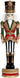 A decorative nutcracker figurine standing on a round base, with a black and white striped body, red and gold ornate jacket, green sleeves, and a black and gold hat.