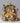 Nativity scene figurine with Mary, Joseph, and baby Jesus on a dark background