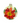 Decorative Christmas ornament with red and gold poinsettia design on a blurred light background