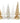 Six decorative miniature Christmas trees in assorted metallic and frosted finishes, including gold, silver, white, and iridescent gold, arranged in a row against a plain white background.